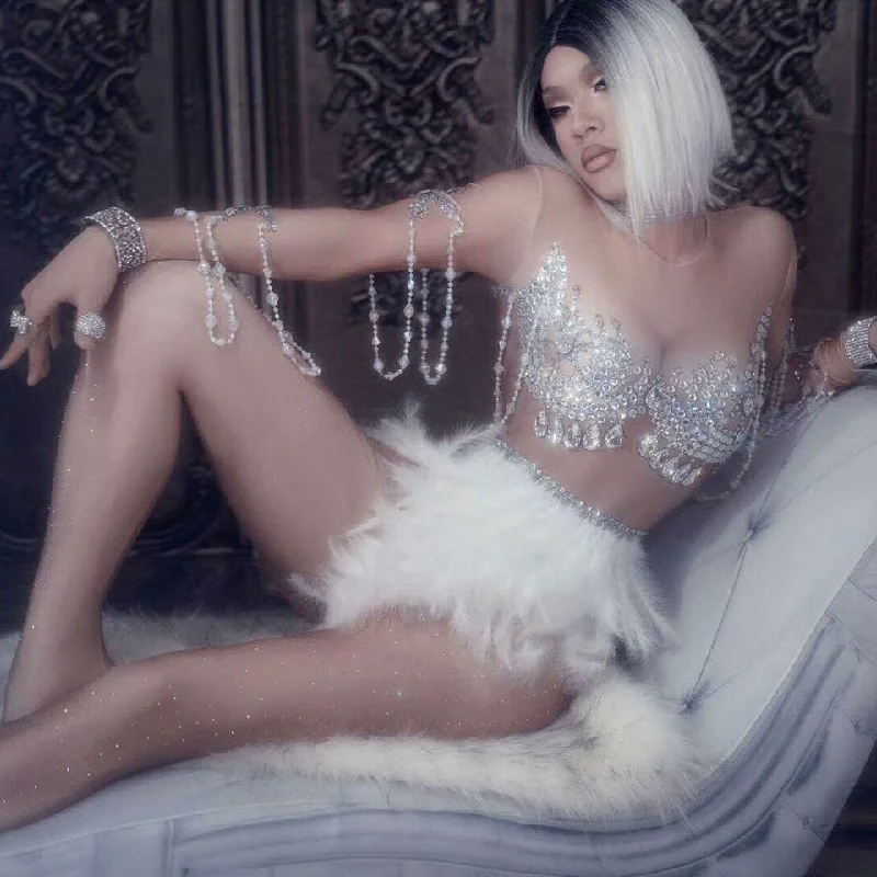 Sparkling Crystals Jumpsuit Nightclub Party Dress Women Sexy Skin Color Bodysuit White Feather Rhinestones Dress Dance Costume Stylish Low-Cut Bodysuit